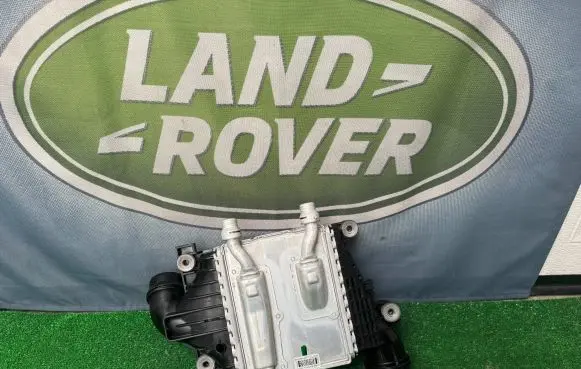 Jaguar XF X260 Intercooler radiator HX736K775AF XC5J7CZ EA22212