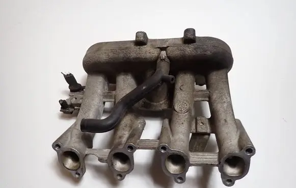 Volkswagen Golf III Intake manifold 030129713D