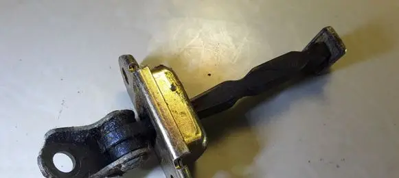 Nissan Micra Front door check strap stopper 