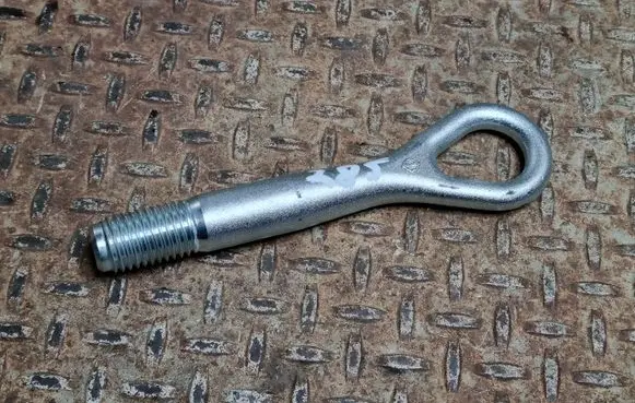 Towing hook eye