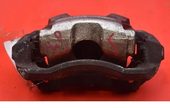 Opel Astra J Front brake caliper 