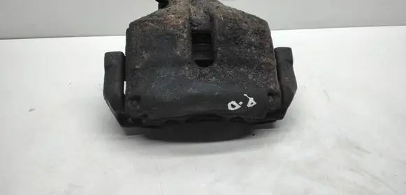 Volkswagen Golf VI Front brake caliper