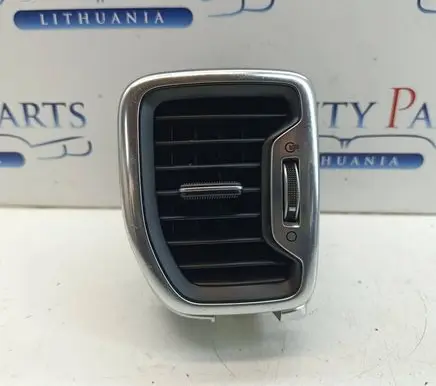 KIA Sportage Dash center air vent grill F03880101A