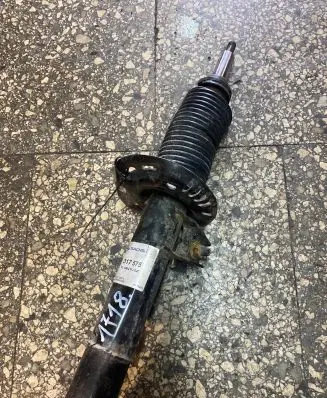 Volkswagen Caddy Front shock absorber/damper