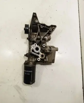 Skoda Octavia Mk2 (1Z) Oil filter mounting bracket 06j903143