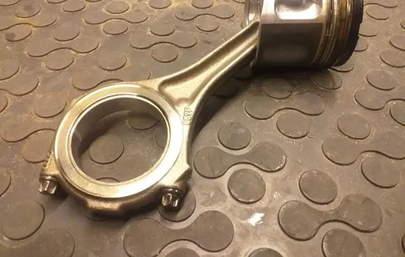 Piston with connecting rod