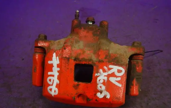 Mitsubishi Lancer VIII Front brake caliper
