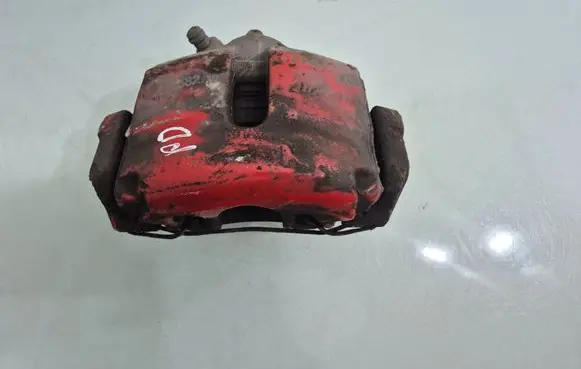 Volkswagen Golf V Front brake caliper