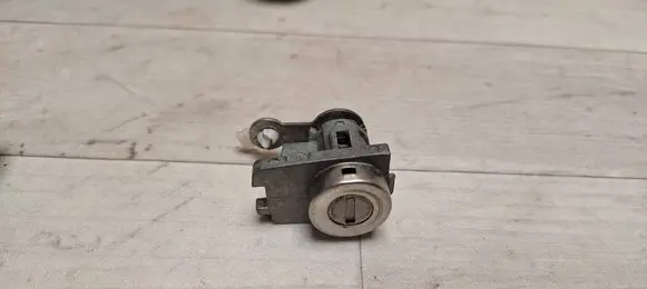 Chevrolet Aveo Front door lock (next to the handle) 