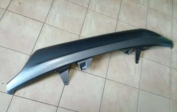 Rear bumper trim bar molding