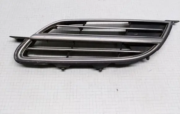 Nissan Almera Tino Front bumper upper radiator grill 623304U100