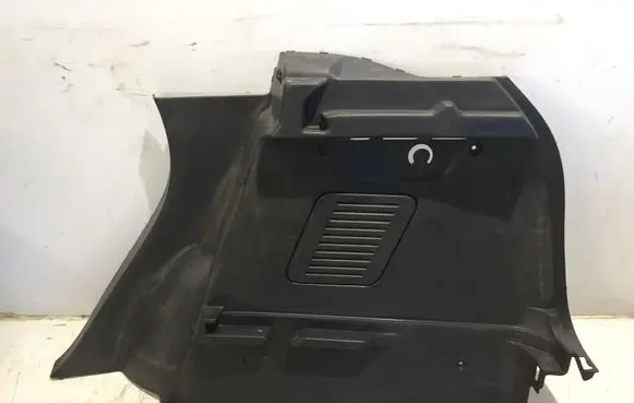 Trunk/boot lower side trim panel