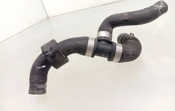 Volkswagen Golf VII Engine coolant pipe/hose 04L122073B