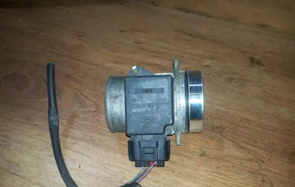 Mazda 121 SM Mass air flow meter 96fb12b579eb