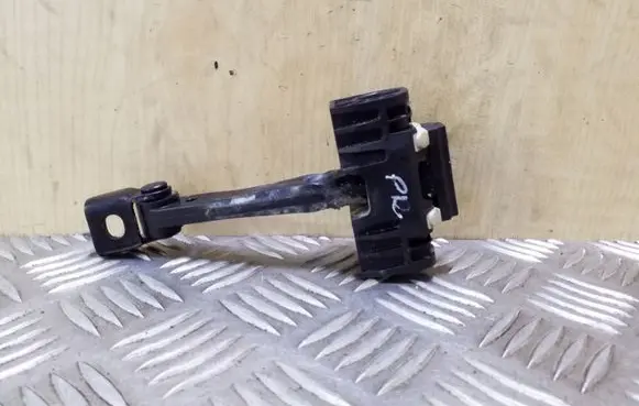Front door check strap stopper
