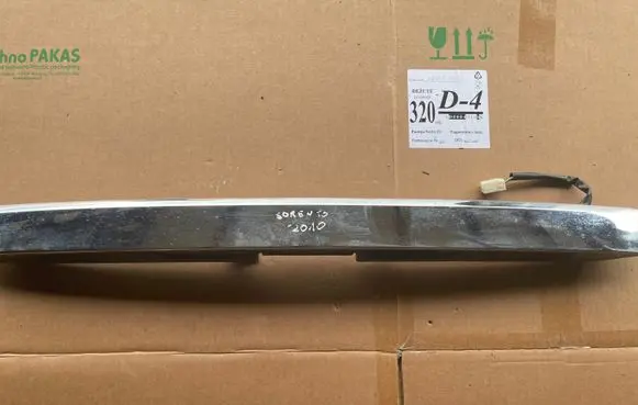 Trunk door license plate light bar