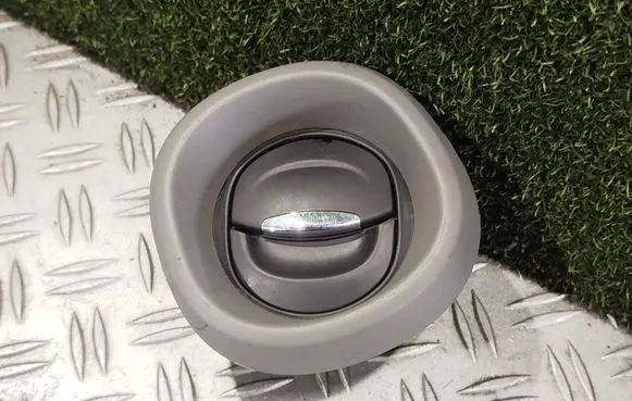 Dashboard side air vent grill/cover trim