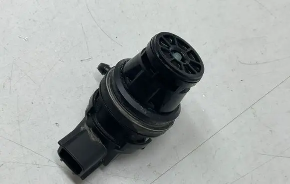 Subaru Forester SL Headlight washer pump 0602106110