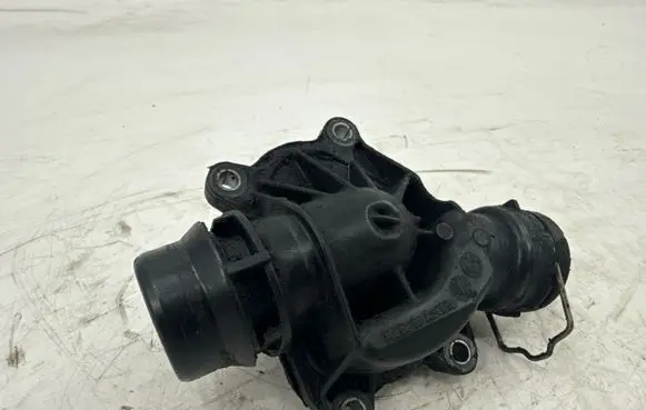 Thermostat/thermostat housing