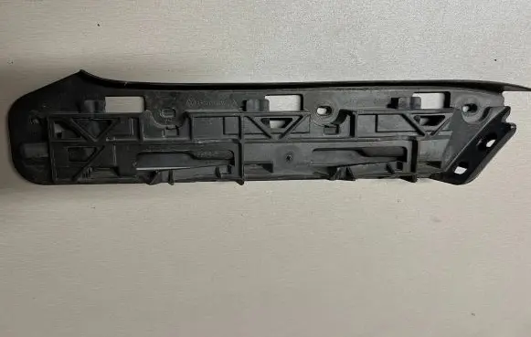 Volkswagen Caddy Front bumper mounting bracket 1T0807049
