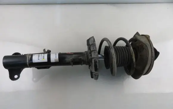 Front shock absorber with coil spring