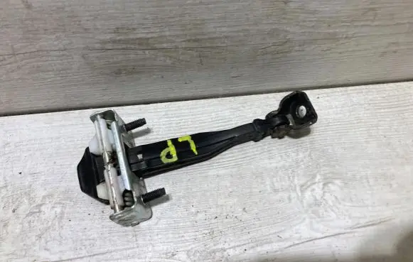 Ford Fiesta Front door check strap stopper H1BBA23500AA
