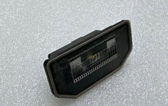 Tesla Model 3 Number plate light 144973000B GRKM212736371670 9786001