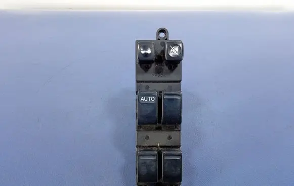 Nissan Primera Electric window control switch 25401AV640