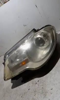 Volkswagen Touran I Headlight/headlamp 0301233601