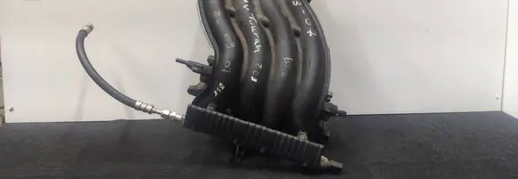 Volkswagen Caddy Intake manifold 06A133203BN