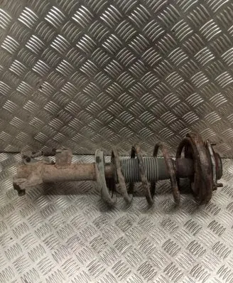 Nissan Primera Front shock absorber with coil spring