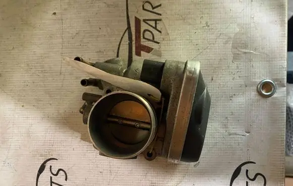 Volkswagen Touran I Throttle valve A2C53042125 06A133062AB 04491T