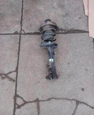 Front shock absorber with coil spring