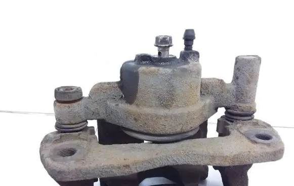Mazda 323 Front brake caliper
