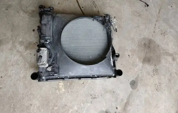 Radiator support slam panel
