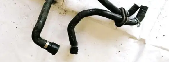 Volkswagen PASSAT B5 Engine coolant pipe/hose 8d0819371an