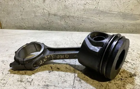 Piston with connecting rod