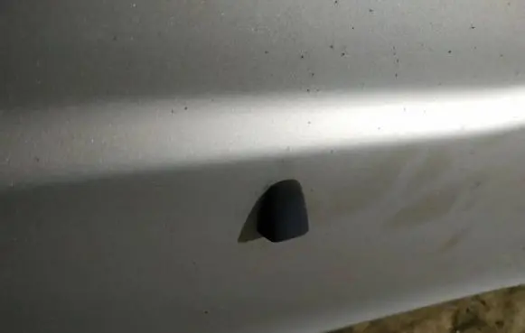 Windshield washer spray nozzle