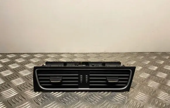Dash center air vent grill