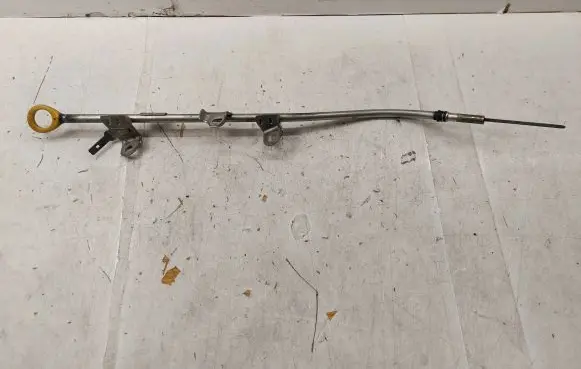 Oil level dip stick