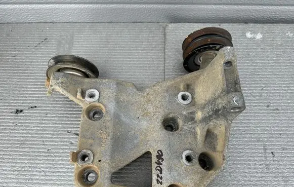 Nissan King Cab, Navara Pneumatic air compressor holding bracket 11910VK500 11927AD201
