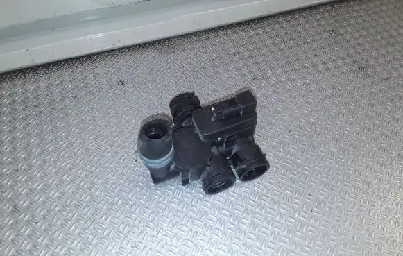 Coolant heater control valve