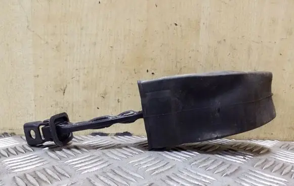 Front door check strap stopper