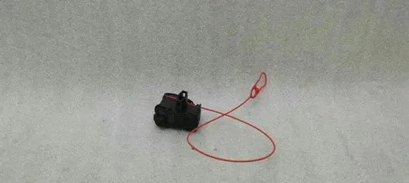 Fuel tank cap lock motor
