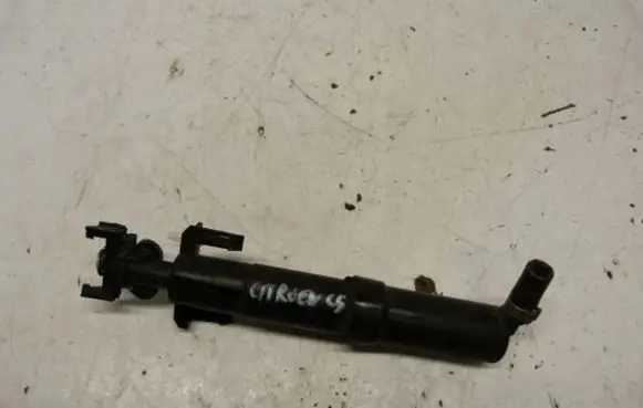 Headlight washer spray nozzle