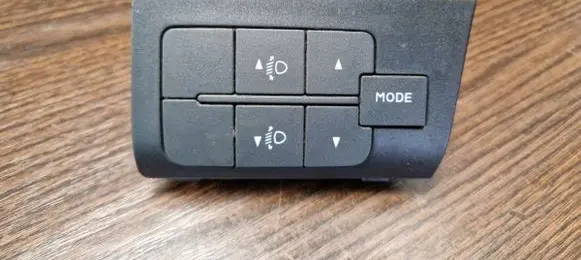 Headlight level height control switch