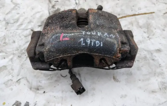 Volkswagen Touran I Front brake caliper 