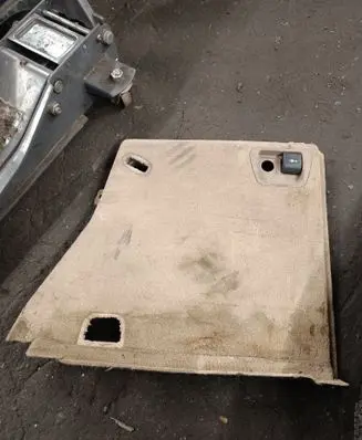 Trunk/boot lower side trim panel