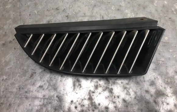 Mitsubishi Colt Front bumper upper radiator grill MN127774BILI MN127774