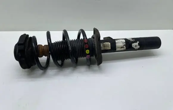 Volkswagen Touran II Front shock absorber with coil spring 1T0412015PR